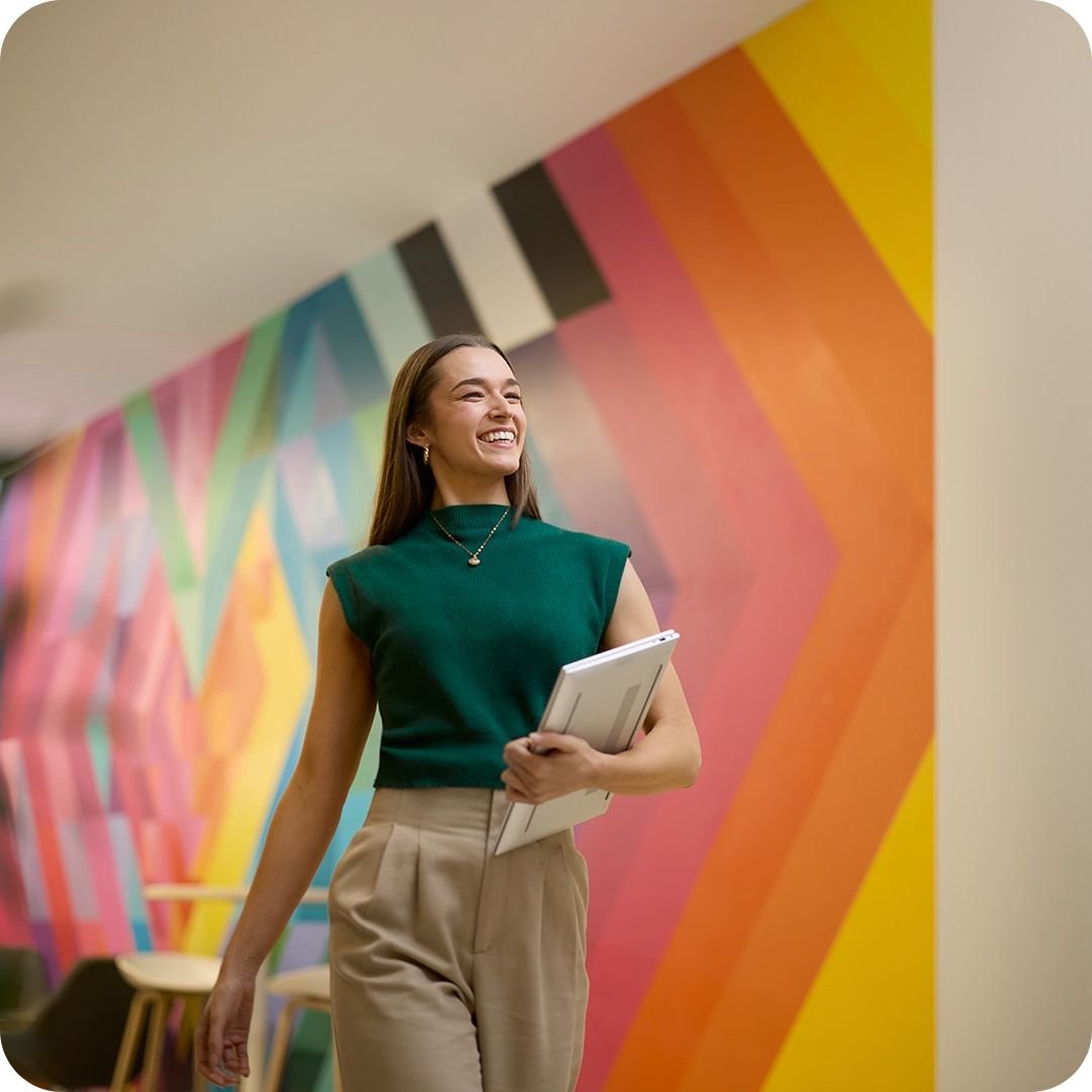 Diversity Equity Inclusion Woman in office in business attire KV